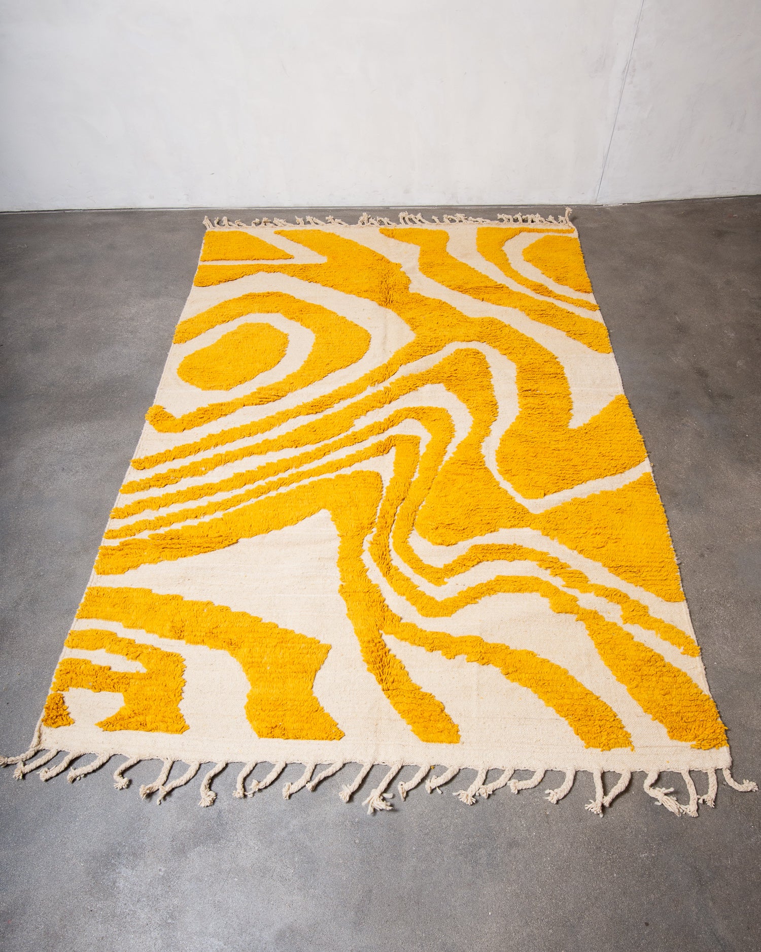 Modern, designer, handcrafted Berber rug from Morocco. Beniourain carpet with beautiful colours and patterns and fluffy wool texture.